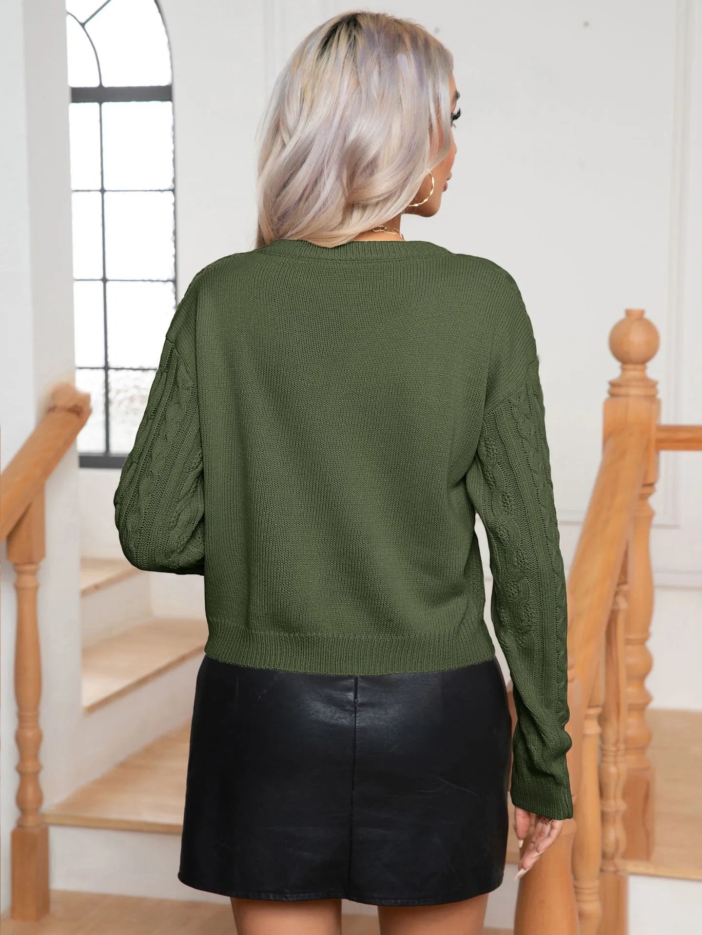 Pull femme luxueux en maille torsadée, finition élégante et coup raffinée