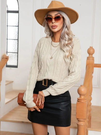 Pull femme luxueux en maille torsadée, finition élégante et coup raffinée